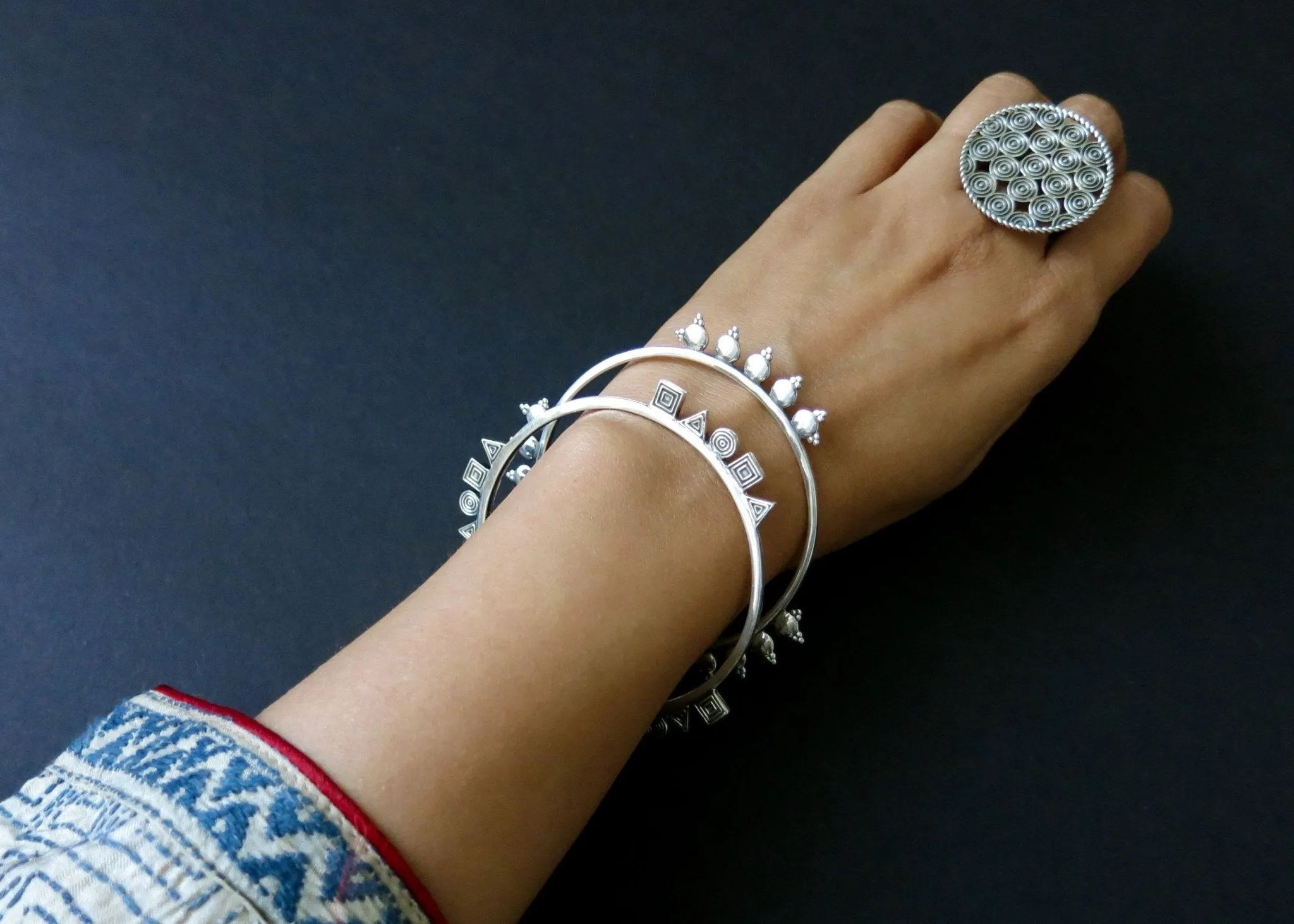 NKOSI neo-tribal bangle with geometric motifs