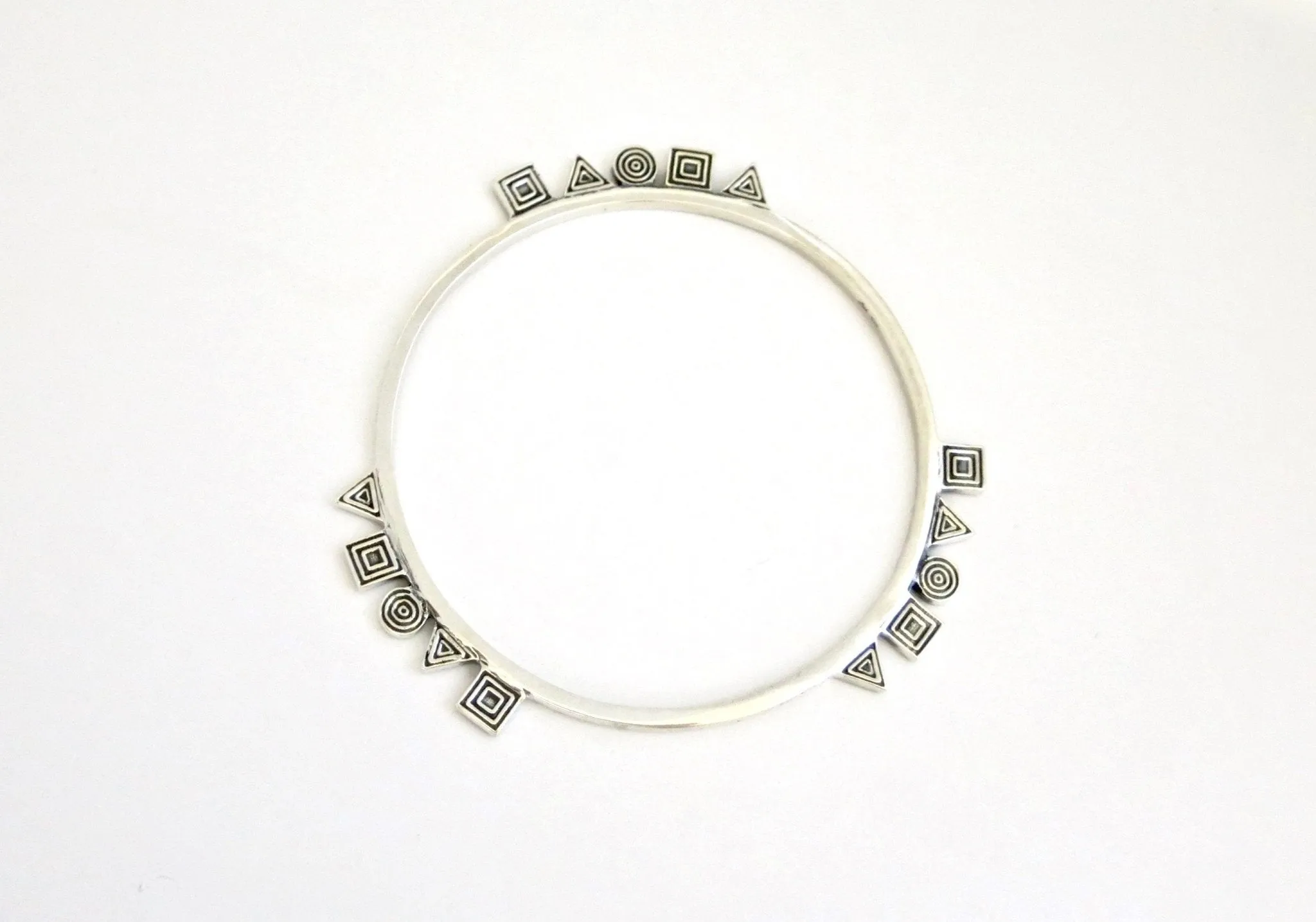 NKOSI neo-tribal bangle with geometric motifs