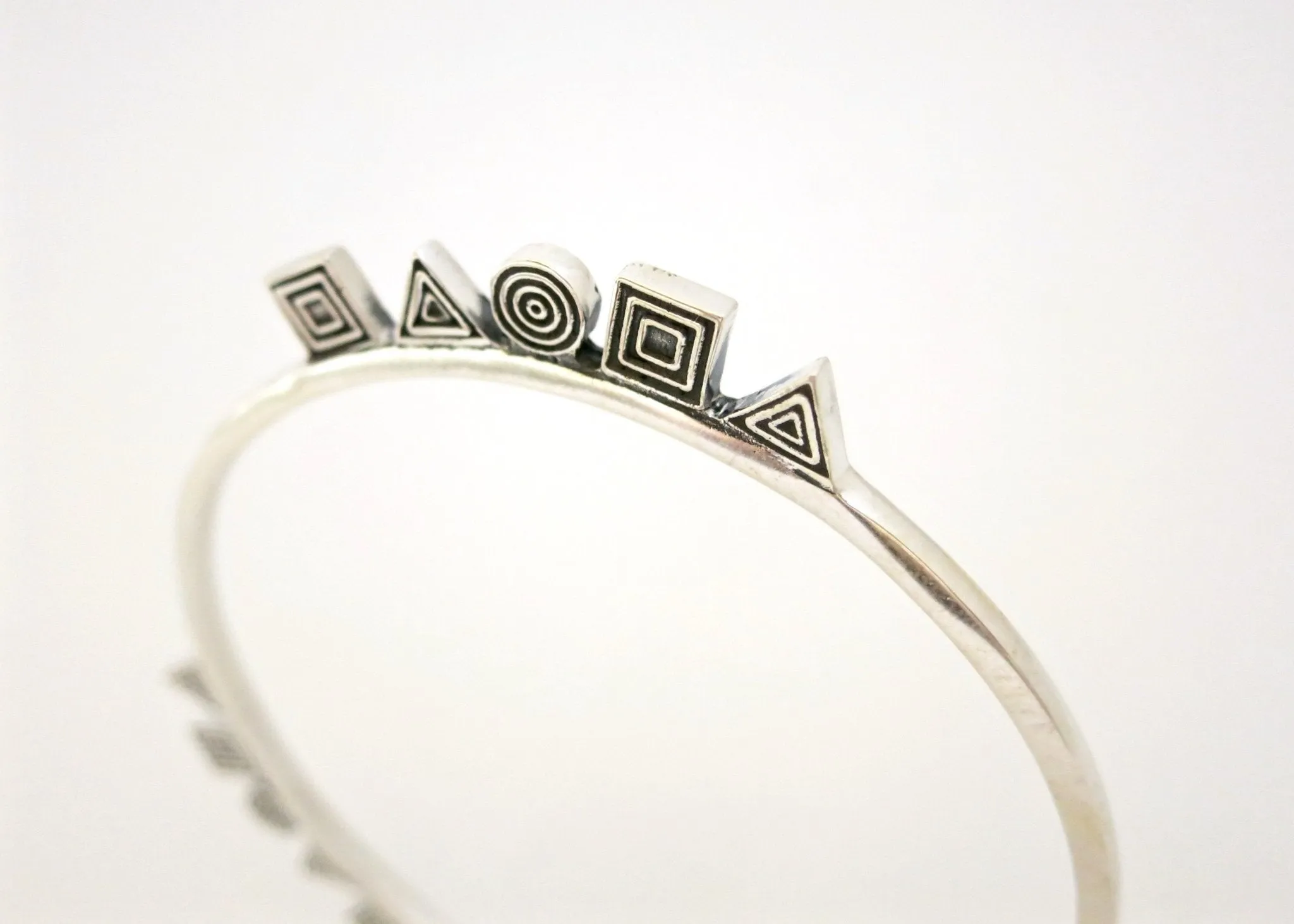 NKOSI neo-tribal bangle with geometric motifs