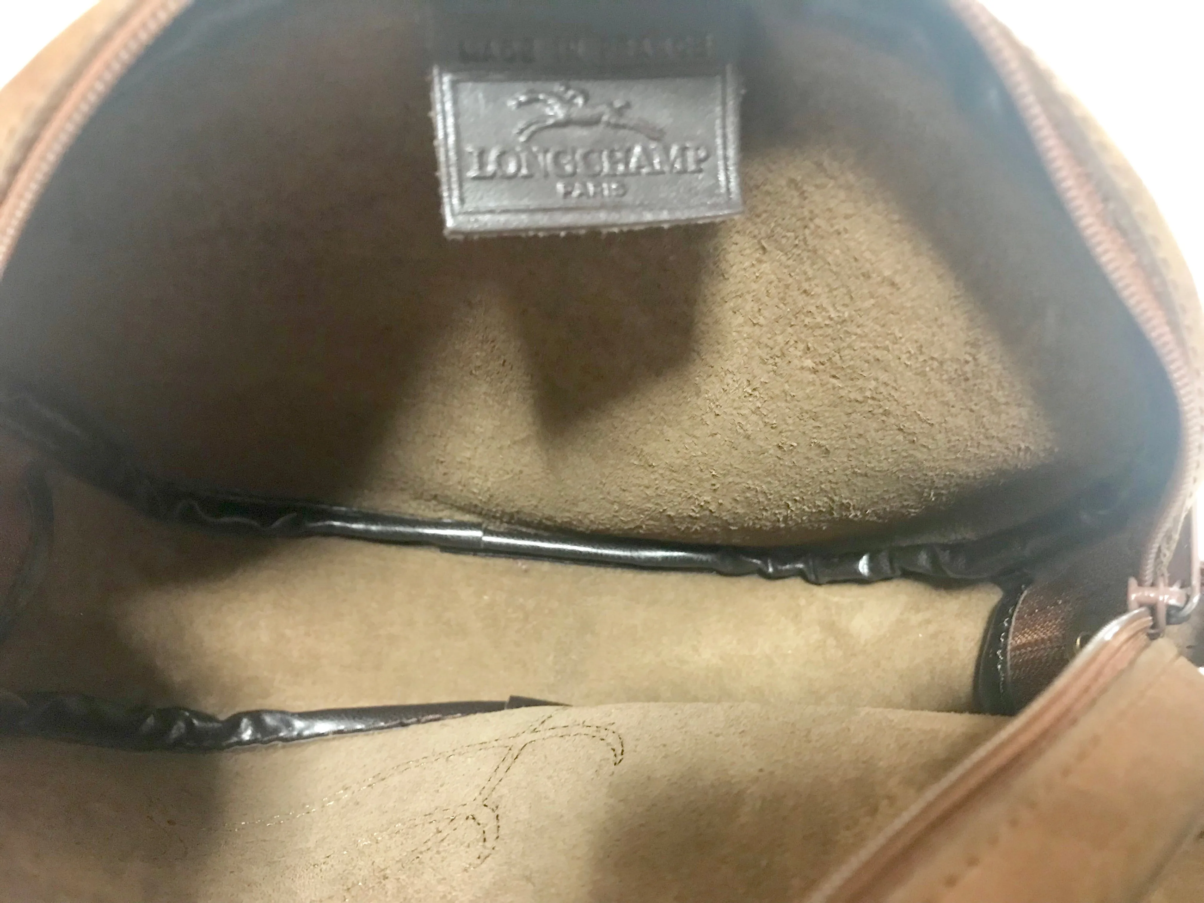 Vintage Longchamp brown suede leather oval round shape shoulder bag with leaf applique motifs. Rare and unique bag back in the okd era.