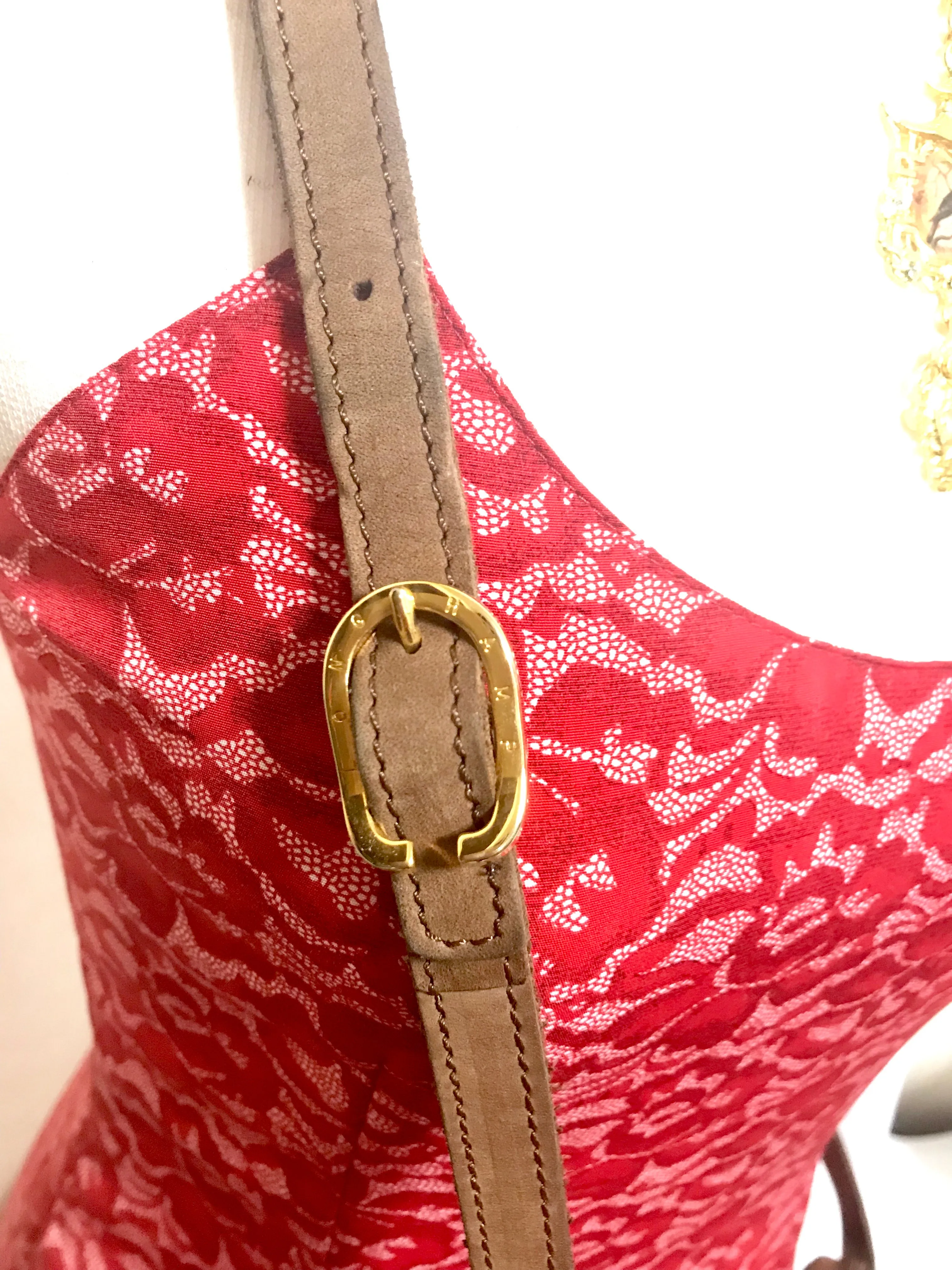 Vintage Longchamp brown suede leather oval round shape shoulder bag with leaf applique motifs. Rare and unique bag back in the okd era.
